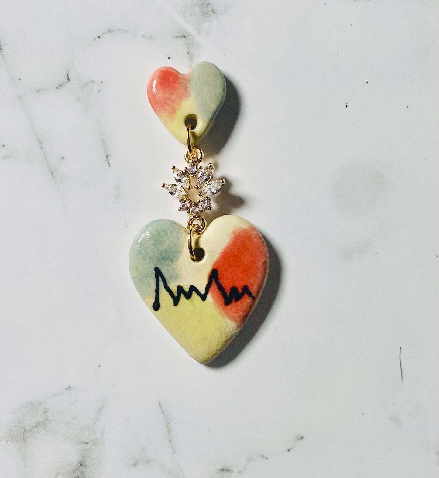 Love me now earrings.